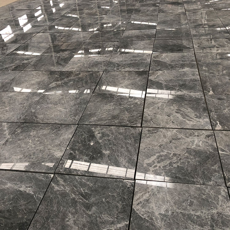 What are some alternatives to marble tiles for those looking for a similar aesthetic but with different properties and price points?